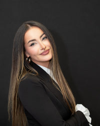 Camille J.